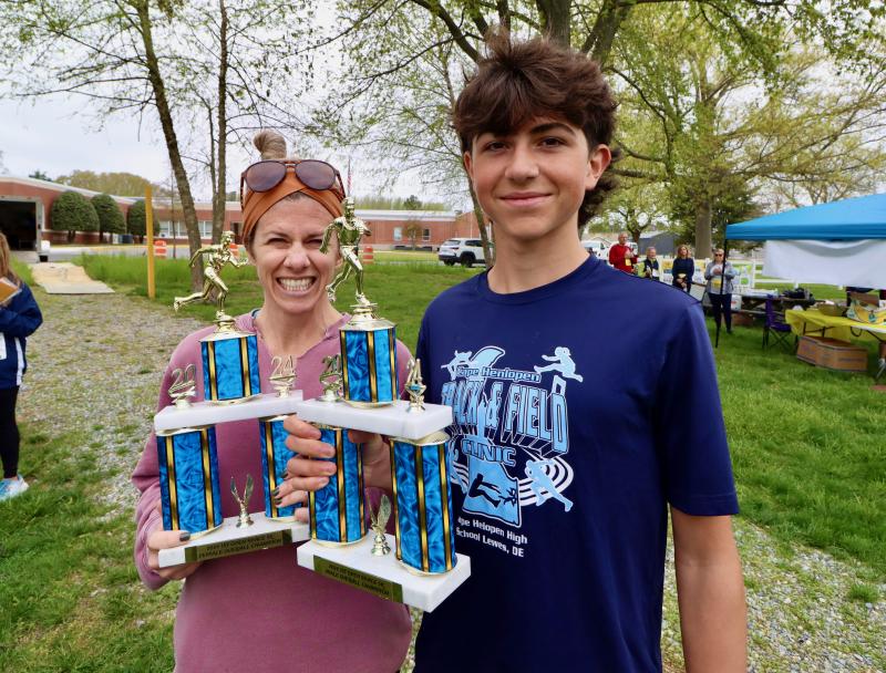 The overall women’s champion Melissa Wiley of Ocean City, Md., and overall male champion Riley Stazzone, a student at Cape Henlopen High School.