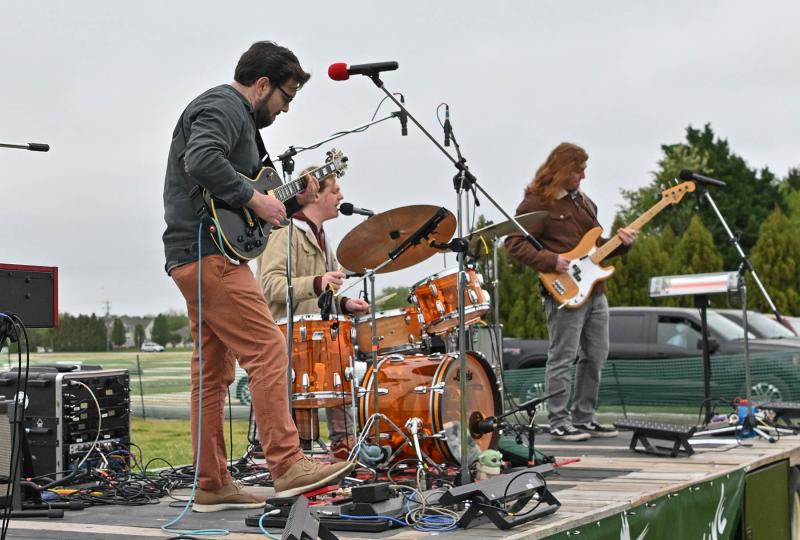 Playing an Allman Brothers song are Otto Grundman on guitar, Alex Fitzkee on drums and Drew Fitzkee on bass. Not shown is Nick French on keyboard.