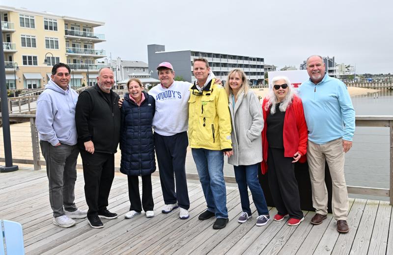 Friends and supporters on hand for the announcement are (l-r) Jim Paoli, Vince DiFonzo, Anne Marie O’Conor, Woody’s owner Jimmy O’Conor, Dewey Town Manager Bill Zolper and his wife Kelly, former Dewey Mayor Pat Wright and Dewey Commissioner Paul Bauer.