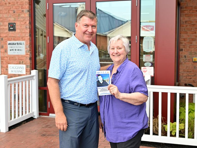 Steve “Monty” Montgomery of The Starboard and Bethany Blues stands with Spoonie’s mother, Theresa. The event raised $10,125, so organizers will receive the $5,000 challenge gift from The Starboard and Bethany Blues restaurant group.