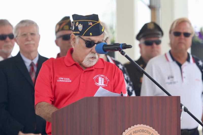 Tom Dahl, commander of American Legion Post 5, serves as the emcee for the morning’s Memorial Day observance.