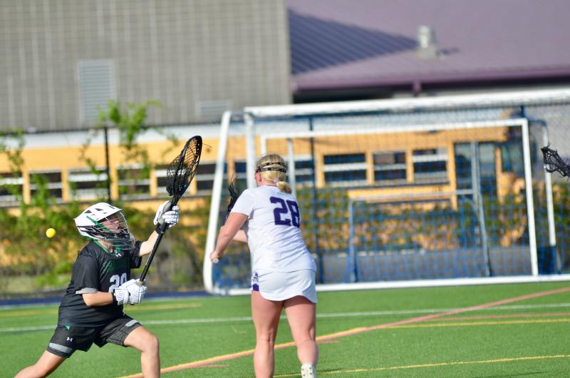 Sussex Academy senior Callie Short finishes a one-on-one with the goalie for one of her three goals scored in a 90-second span.