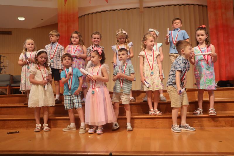The Pelican Class celebrates its official graduation. In back are (l-r) Emery Taylor, Kiernan Kane, Eleanor Cinque, Luca Anthenelli, Hadley Hopkins, Mckinlee Mays and Bryson Day. In front are Cassie Danz, William Dashiell, Morgan Moskowitz, Luke Blondin, Penelope Dempsey, Wade Bertoncini and Caroline Coveleski.