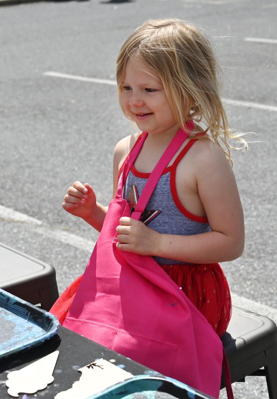 Skylar Krantz, 4, of Milton is all smiles as she sees the finished product. She created a magnet for Mother’s Day with the Developing Artist Collaboration.