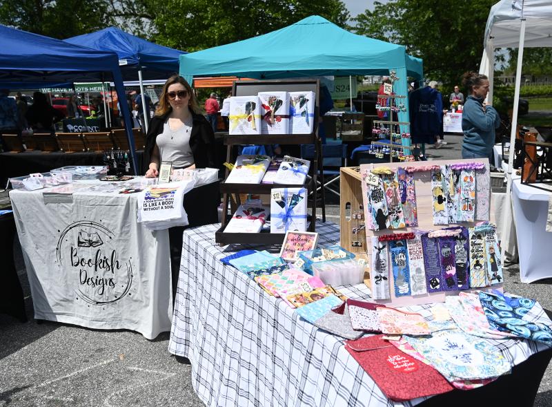 Sabina Ghiultu shows off some of the items from Bookish Designs, which offers handcrafted gifts geared toward book lovers.
