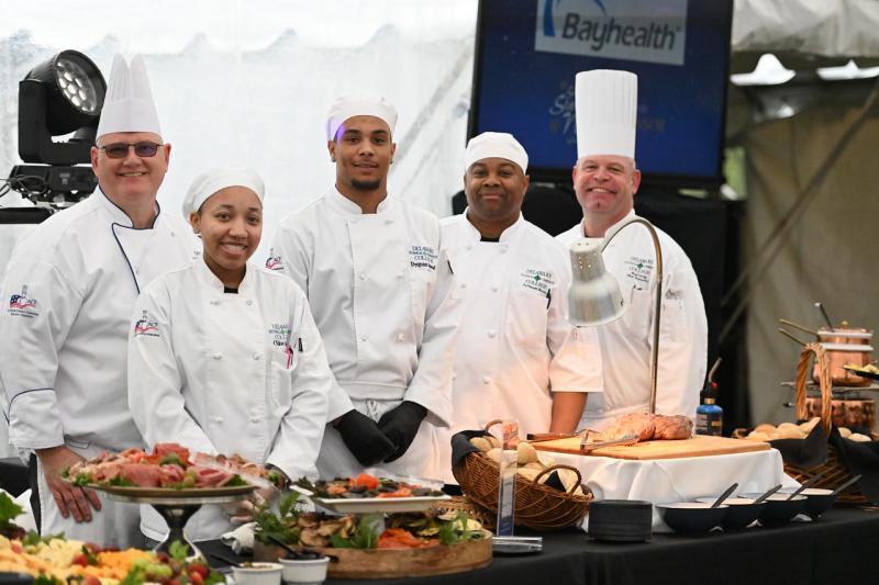 Members of the Delaware Tech culinary team working to provide tasty fare for gala guests are (l-r) Chef Joe Sakers, students Chloe Jordan, Dyquan Snead and Lavincent Harris, and Chef Matt Casey.