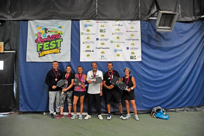 Shown are (l-r) 3.5 winners Tom Steadman and Michelle Steadman (bronze), Vern Rouse and Robert Solano (gold), and Ken Quezada and Karla Araujo (silver).