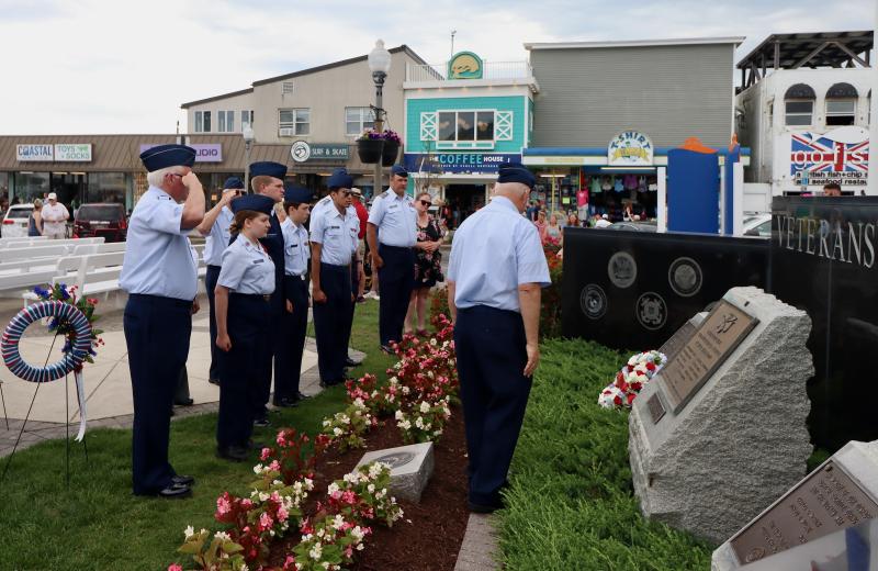 Lt. Col. Robert Turner, Civil Air Patrol, right, leads members in a wreath-laying ceremony and tribute to CAP veterans who lost their lives.