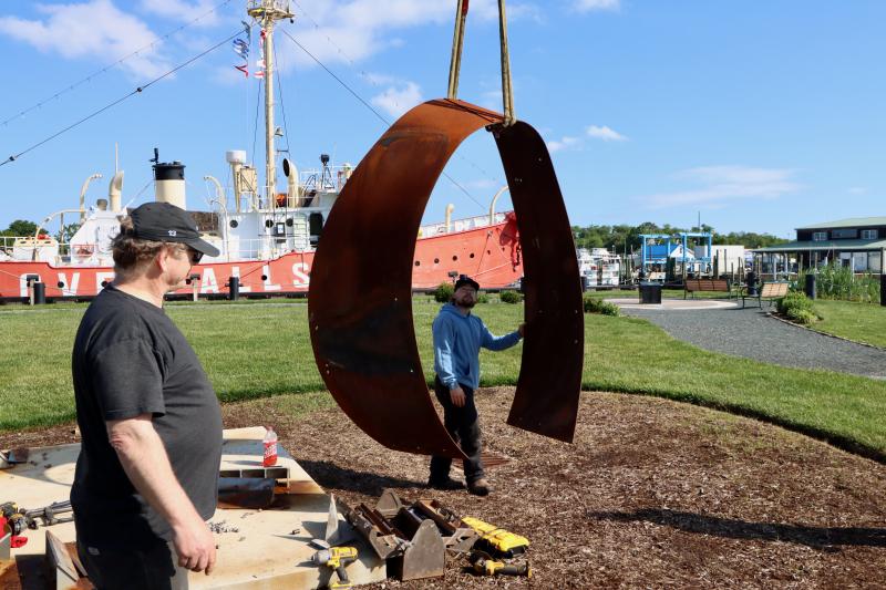 The final piece of the sculpture is removed from Canalfront Park. The Lewes Board of Public Works provided the truck to lift the pieces.