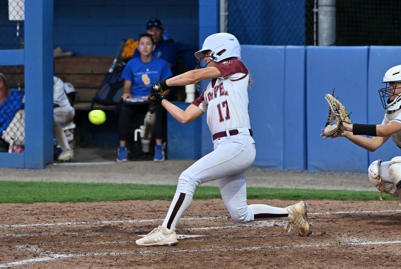 Caravel senior pitcher Kasey Xenidis knocks a 3-2 pitch into center field to score two RBIs and lead the Bucs to their third DIAA State Championship over the Knights in the last four years.
