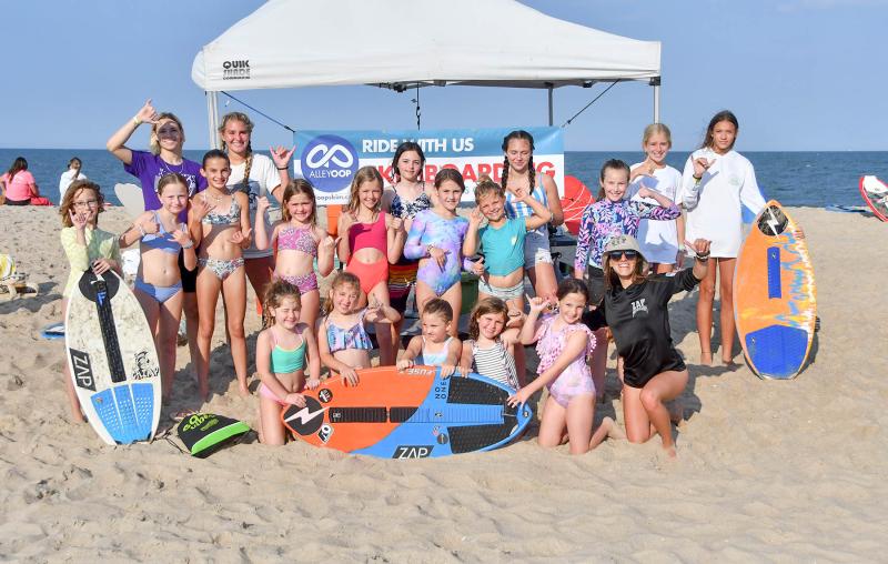 Skimboarders involved in the all-girls’ skim camp hosted by Sydney Pizza and Alley Oop include in back (l-r) Zoe Bell, Brooke Zolper, instructor Rylea Sinex, Morgan Ryan, instructor Brynne Fox, Tyler Dorrier, Dylan Dorrier, Addison Zaniewski, Madelyn Russell, Addison Wedmore, Danica Petrone, Fiona Neherbas, and instructors Lyla Fox and Savannah Hope. In front are Hunter Dorrier, Harper Class, Elsie Booth, Charlotte Roach, Lainie Booth and director Sydney Pizza. DAN COOK PHOTOS