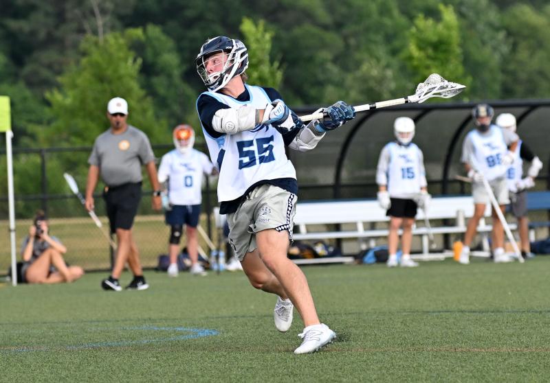 Shorebreak Lacrosse middie Reese Stone (Mary Washington) cranks the rock and scores on the Flaming Windows squad.