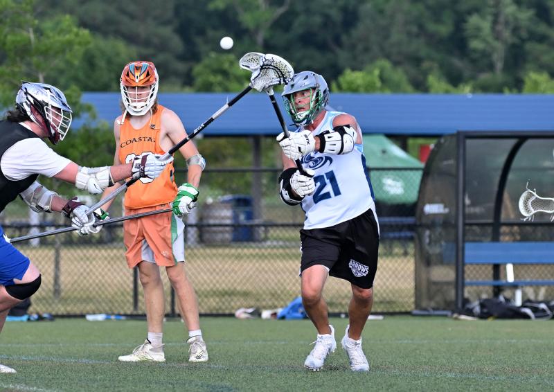 Shorebreak Lacrosse middie Ben Todd (Wesley College) shoots and scores. He tallied three goals in the game.