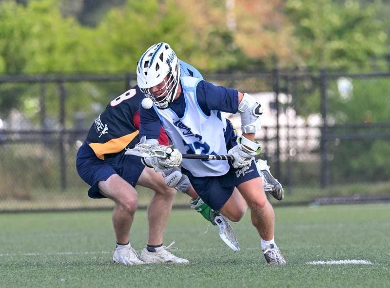 Former Cape FOGO CJ Fritchman (Salisbury University) won 90% of the face-offs in the 26-1 Shorebreak Lacrosse victory over the Flaming Windows squad.