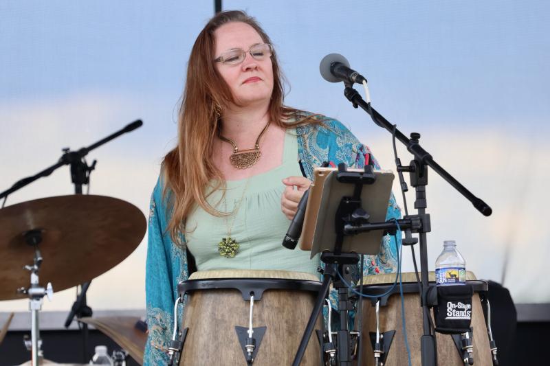 Melody Trucks, whose father Butch Trucks was in the Allman Brothers band, performs with the Fitzkee Brothers.