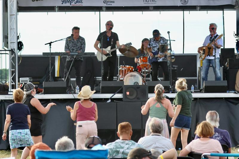 Bad River had people dancing at the third annual Paul Kares Concert for the Kids at Eagle Crest near Milton. Shown on stage are (l-r) Tony Sciuto of the Little River Band, Eliot Lewis of Hall & Oates, Alex Fitzkee of the Fitzkee Brothers on drums, international recording artist and guitarist Robbie LaBlanc, and Paul Cullen, formerly of Bad Company, on bass. BILL SHULL PHOTOS