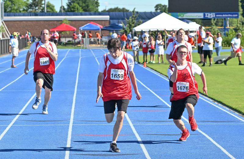 Riptide sprinters Steven Douglas, Andrew Detwiler, Max Popelsky and Donald Jefferson compete for gold in the 50-meter dash.