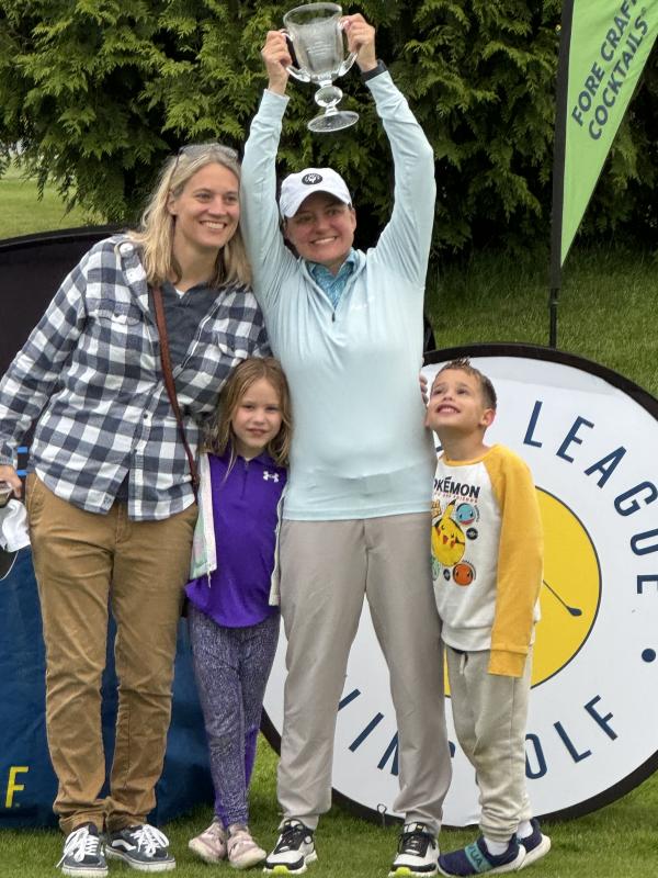 Amy Lewis holds up her World League FlingGolf New Swarm Classic trophy after taking first at the May 17-19 event, while competing in just her third tournament ever. Lewis had finished in fourth for the previous two classics. Shown are (l-r) Maggie Lewis, Quinn Lewis, Amy Lewis and Ethan Lewis. SUBMITTED PHOTO