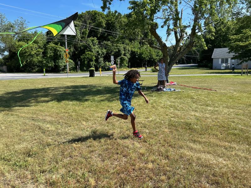 Orun Russell-Jenkins gets up a head of speed to let his kite fly. RYAN MAVITY PHOTOS