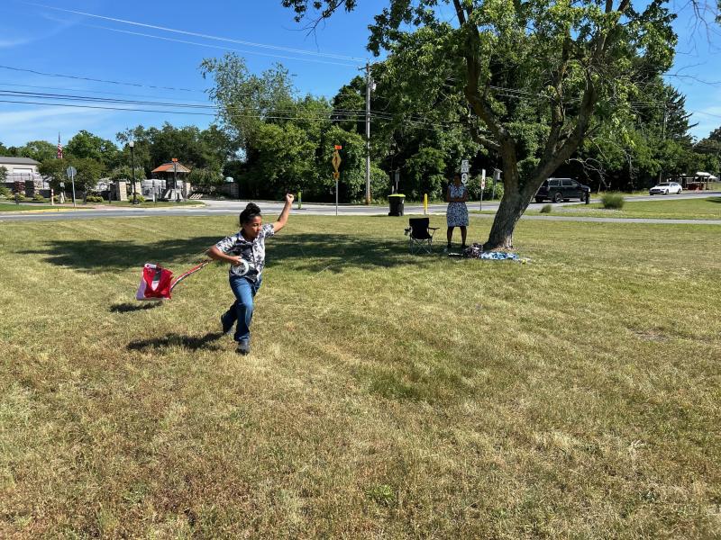 Orun DeSilva-Stanley of North Beach, Md., flies her kite.