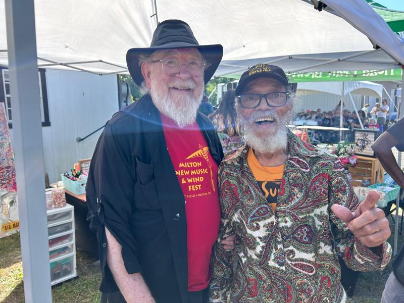 Event organizer Bill Warrell, left, with Marshall Allen, who was conducting headline performer Sun Ra Arkestra.