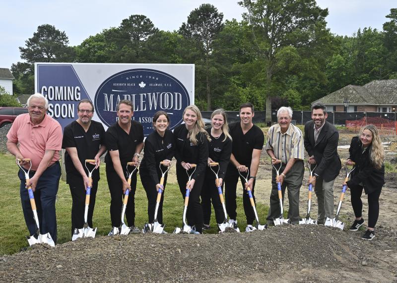 Maplewood Dental Associates broke ground June 5 on a new location in Selbyville. Shown are (l-r) Sen. Gerald Hocker, R-Ocean View; Dr. Steve Wright, co-owner and dentist of Maplewood Dental; Dr. Dan Luckenbaugh, co-owner and dentist; Dr. Katelyn Vincent, associate dentist; Dr. Stephanie Smith, associate dentist; Dr. Katie Townsend, associate dentist; Dr. Dustin Venables, associate dentist; Dr. Bruce Wright, founder of Maplewood Dental; Tyler Barnes, president of Gillis Gilkerson; and Jill Judd, architect of the schematic design. TED PFIRRMANN PHOTOS