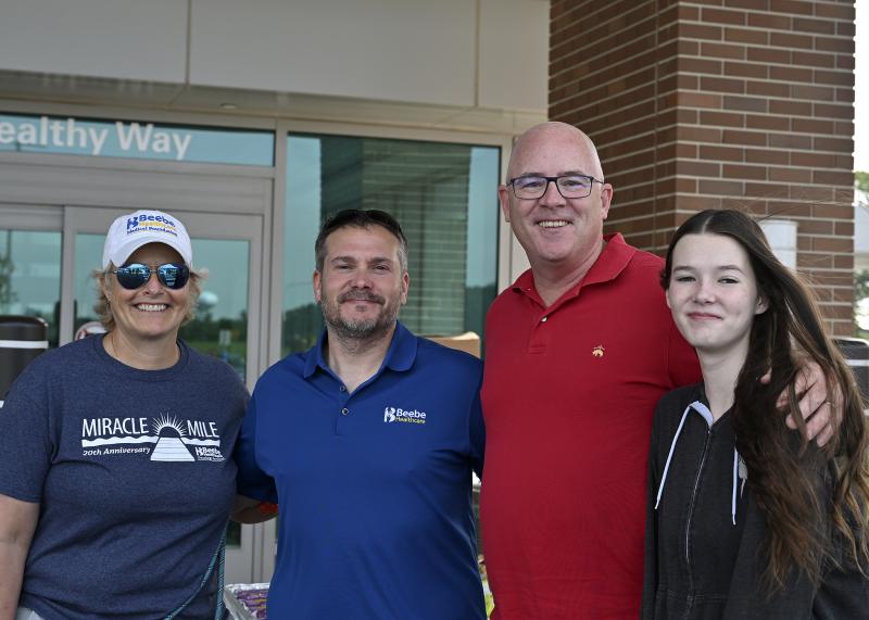 Participating in the Miracle Mile are (l-r) Kay Young, executive director of development at Beebe Medical Foundation; Dr. Bill Chasanov, vice president and chief population health officer at Beebe Healthcare; and Sen. Russ Huxtable, D-Lewes, with his daughter Delaney Huxtable, 14.