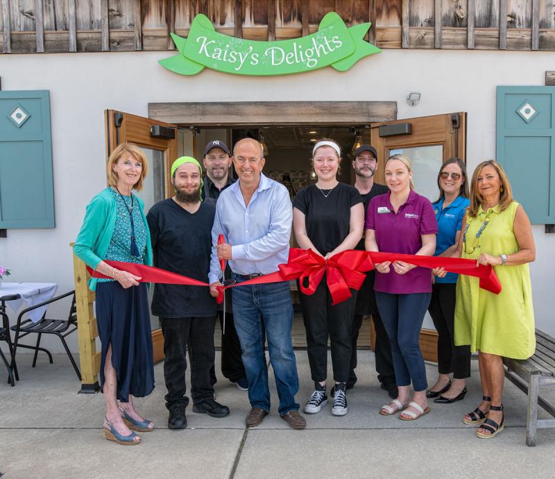 Kaisy’s Delights Elevation XXVI ribbon-cutting attendees shown are (l-r) Betsy Reamer, Lewes Chamber of Commerce executive director; Kaisy’s associates Triston Baull, Freeland Mohr, owner Thierry Langer, Julia Rakin, John Greenan and Rose Coulter; Cristina Windish, WSFS; and Nikky Fisher, Lewes Chamber of Commerce past president. SUBMITTED PHOTO