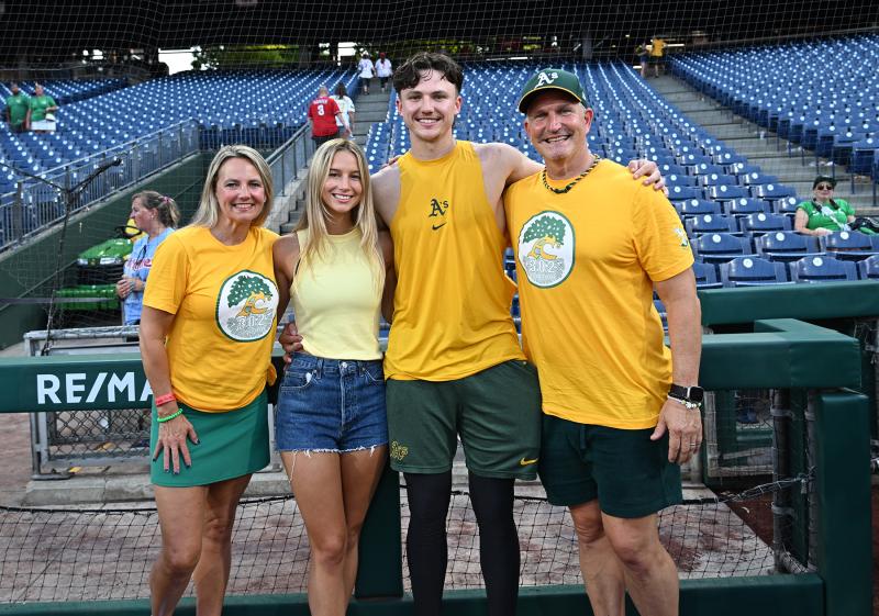 Zack Gelof has a post-game moment with his family. Shown are (l-r) mother Kelly, girlfriend Sarah Arnaudon, Zack and dad Adam.