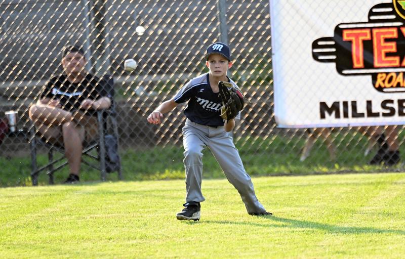 Lane Wyatt makes a play in the outfield for the Milton squad in the final game of the District 3 tournament.