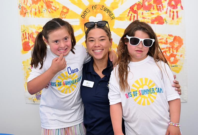 Camp Coordinator Jess Walls, center, poses with cool campers Clara Davila, left, and Lucia Spampinato.