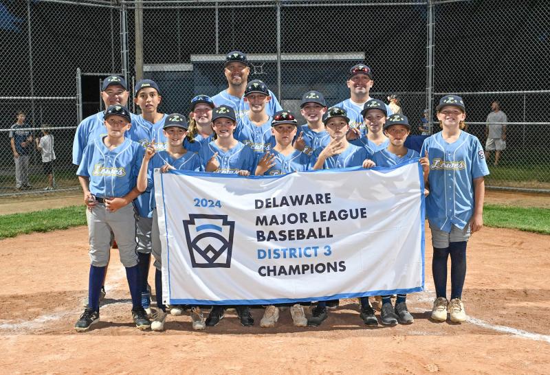 The Lewes squad poses with the District 3 banner. They will play Naamans Little League in the state tournament Wednesday, July 24, in Middletow. Shown are (l-r) manager Jerry Windish, Grant Hershelman, Lucca Tobias, Andrew Mekulski, Jacoby Clark, Cole Kastor, coach Jason Pease, Lucca Fazio, Ben Pease, Jacob Windish, Finn Gannon, coach Zach Fazio, Briggs Gannon, Mason Thompson and Ayden Jester.