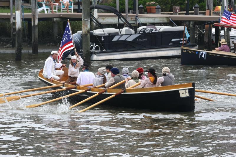 Bill Hicks was at the helm of the whaleboat Albatross from the Lewes Historical Society. They rowed their way to the second-place award.
