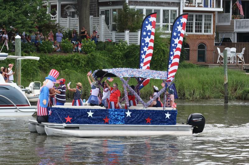 The Sea Sisters came to win – and they succeeded. Capt. Lee Ann Augustine’s crew sailed away with first prize for most patriotic boat.