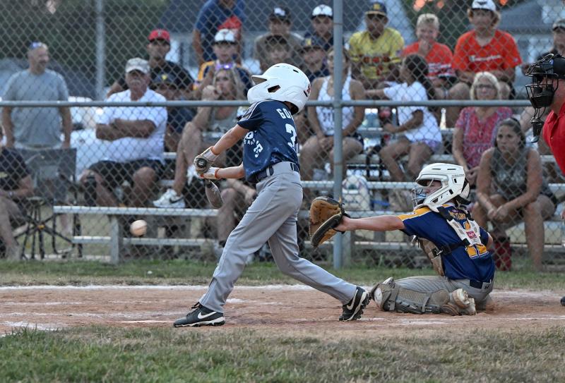 Milton designated hitter Easton Goodwin slams a grounder to first to score Ronan Lotter for the winning run in the fifth inning.