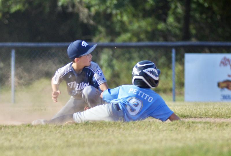 Jaxon Kulp applies the tag after grabbing a dart from Dominic Nelson to catch Joseph Petito trying to steal second in the top of the second inning.