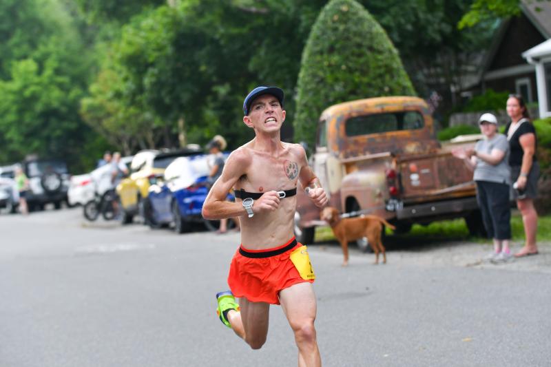 Dylan Smiley blows away the field to earn a personal best of 14:50.