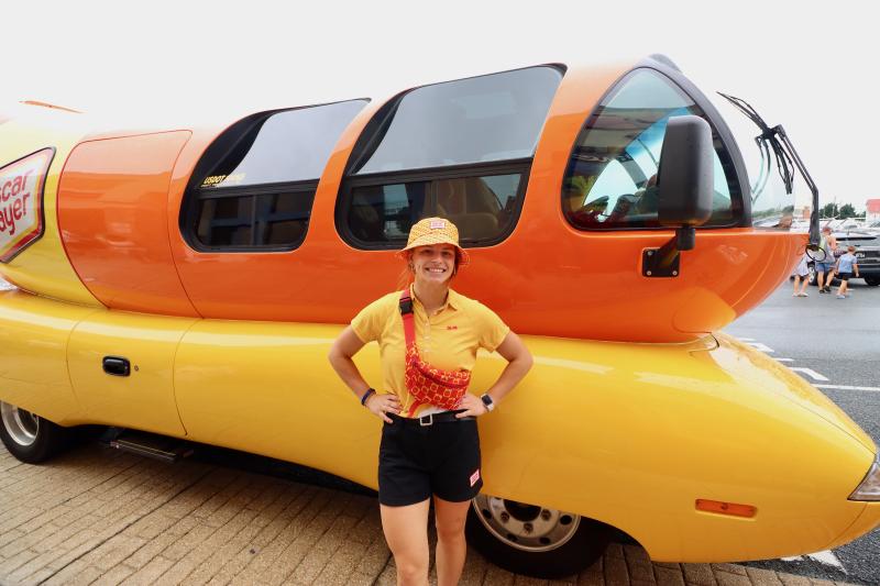 Oscar Mayer’s BBQ Bridgget, who drove the Wienermobile for its trip on the ferry, poses in front of her ride during the Lewes Weis Markets event.
