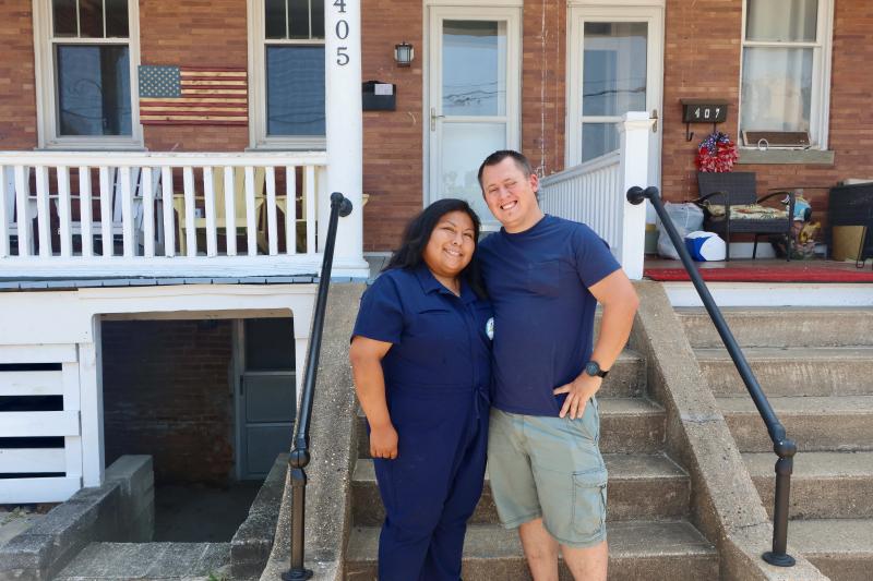 Sarah Prieto, left, and Stephen Matthews stand in front of their home at 405 Savannah Road. The entrance to their proposed basement-level dog grooming business is seen at left. Neighbors on both sides of the historic row home oppose the business, citing concerns about added noise, smell and parking issues. BILL SHULL PHOTO