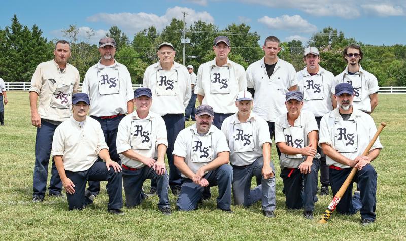 The Rising Sun squad comprises in back (l-r) Eric “Dirt” Campion, Brian “Tex” Besancon, Ken “Doc” Yetzer, Steve “Tree” Marsteller, Chris “Cobb” Wiggins, Russ “Griz” Golden and Chris “Shady” Vaughn. In front are Joey “Bats” Iannone, Jamie “Spike” Workman, Cody “Knollwood” Stanley, Bob “Cheddar” Lambeth, Doug “Chef” Levesque and T.J. “Hack” Veiger.