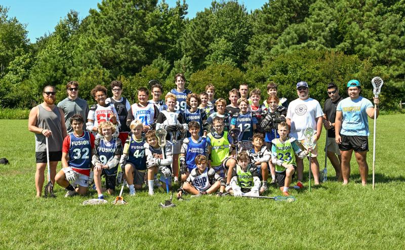 The players and coaches get together before lunch and their fun time at the beach. Shown in back are (l-r) Ian Allender, Josh Ricci, Silas Griffin, Logan Graybill, Cooper O'Donnell, Connor Caslin, Jeffrey Martin, Connor Tinney, Nathan Tilley, Parker Ruderhausen, Kieran Ilardi, Braxton Bartsch, Liam Avedisian, Brady Reigel, Nathan Moffit, Rowan Campbell, Liam Reich, Mattias Pruckmayr, Kevin Philibin, Curtis Smith and Marcus Ford. In front are Colin Shoemaker, Jack Albrand, Miles Via, Hayes Gerczak, Tyler Lorenz, Lucas Miscia, Mason Baker, Elliot Kist, Gabe Washington and Harry Avila. DAN COOK PHOTOS