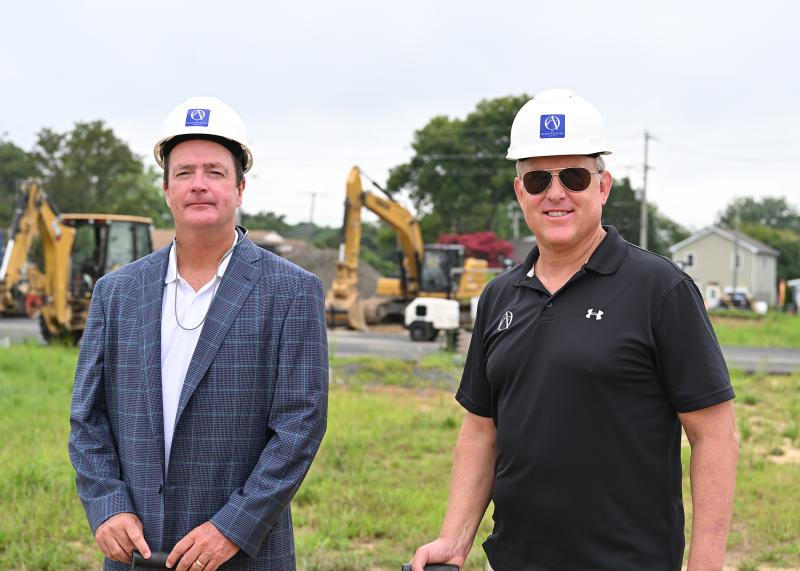 Tom Tipton, left, Ocean Atlantic Companies chief operating officer, chats with developer and OAC Chair Preston Schell.