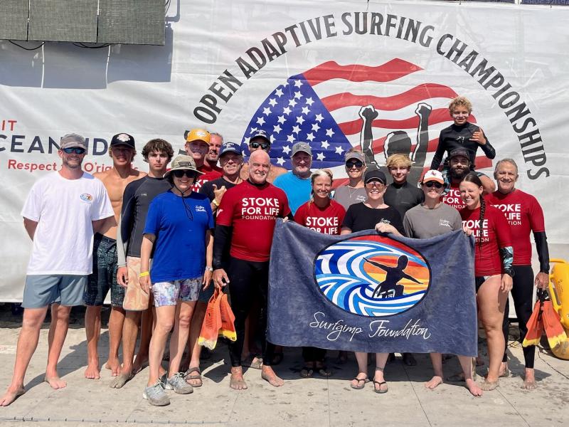 Volunteers from the Surfgimp Foundation helped at the U.S. Open Adaptive Surfing Championships in Oceanside, Calif. The tournament took place Sept. 5-8. Shown are (l-r) Chris Flood, Coleman Woodard, Keegan Dennehy, Dina Land, Liam Dennehy, Brad Dennehy, Nick Rooth, Ron Phillips, Noah Marsh, Steve Huber, Bailey Henzler, Suzannah Frederick, Melanie Liesener, Will Frederick, Melissa Land, Adam Land, James Frederick, Brittany Coffey and Jeff Land. SUBMITTED PHOTO