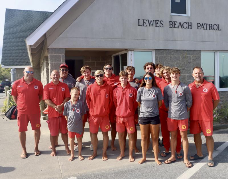 Lewes lifeguards at their headquarters after the inaugural awards ceremony Aug. 31. Shown are (l-r) Capt. Strohm Edwards, Lt. Matthew McDonough, Chris Gardner, Mason Edwards, Trax Rogers, Trent Kauffman, Landon Hudson, Nathanael Taylor, Jackson Hagy, Cassidy Thomas, Brady May, Jaxen Edwards, Kagan Rogers, Jacob Madden and Chief Mark Woodard. BILL SHULL PHOTOS