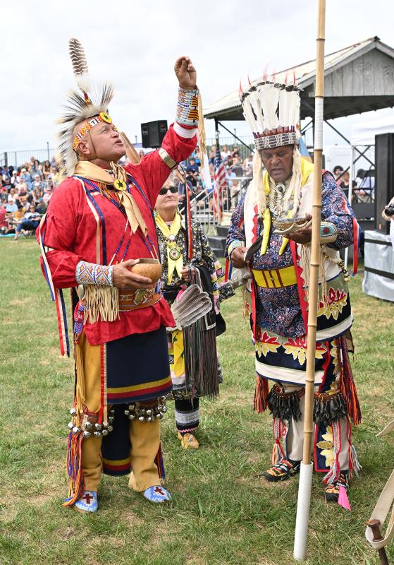 Larry Jackson, left, Nanticoke storyteller Ragghi Rain and Herman Jackson fulfill the blessing of the dance circle.