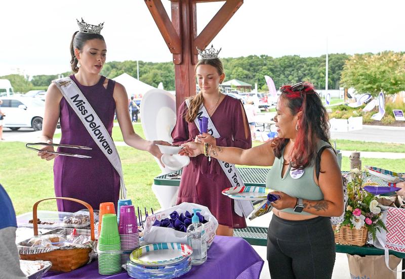 Helping to dish up the survivor dinner to Lisa Nazareth are Nova Rae Gaffney, Miss Delaware 2024, and Gabby Morgan, Miss Delaware Teen 2024.