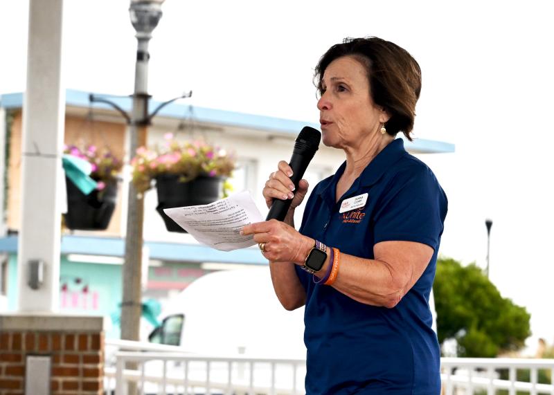 Donna Cleary, director of development for ALS United Mid-Atlantic, speaks to the crowd of enthusiastic supporters.