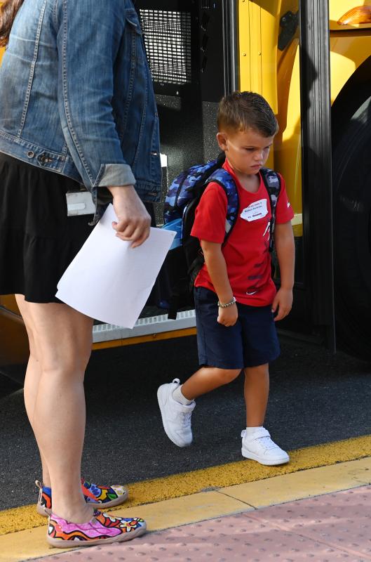 The first day of school isn’t for everyone. Kindergartener Hudson Sockritter reluctantly makes his way into Milton Elementary. NICK ROTH PHOTO