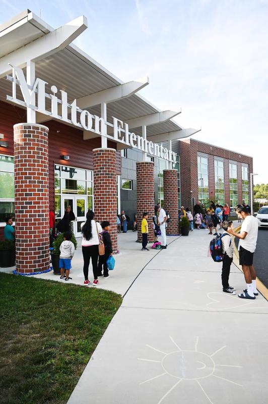 Students and their families gather in front of Milton Elementary on the first day of school. NICK ROTH PHOTO