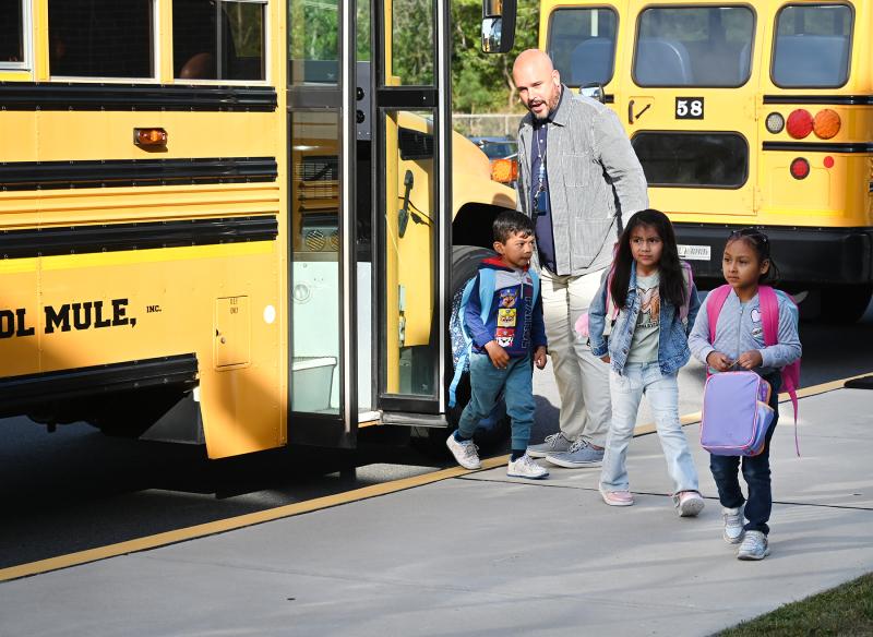 Milton Elementary Assistant Principal Jason Scott tells arriving students where to go. NICK ROTH PHOTO